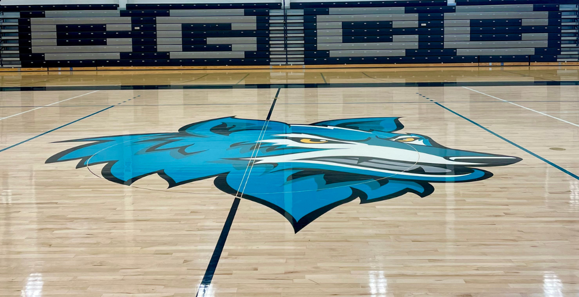 The CGCC Coyote logo on the basketball court