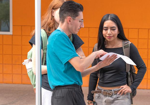 CGCC staff member assisting a CGCC student with academic support