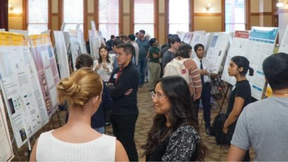 Attendees look at posters at ASU’s School of Molecular Sciences’ Inaugural Spring Research Poster Symposium
