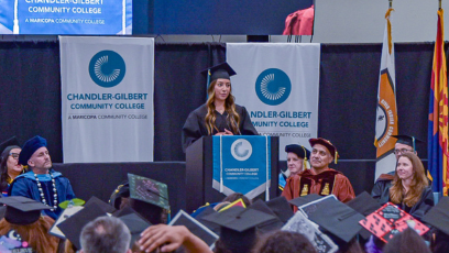 Madison Shumway speaks at the podium at the 2026 CGCC Commencement Ceremony