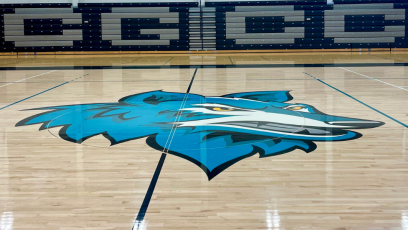 The CGCC Coyote logo on the basketball court