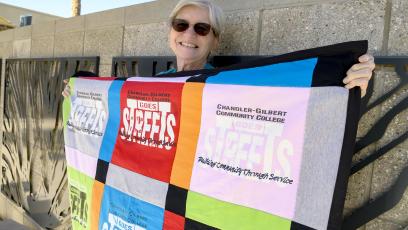 Teresa Hull and her quilt