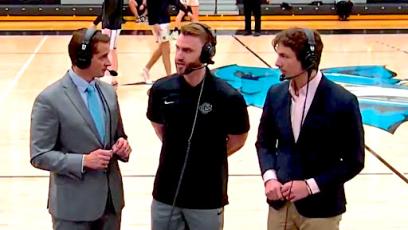 Pequeno, Brown, and McKurdy talk before a CGCC basketball game. 