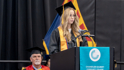 Kaitlin Greathouse at speaking at the 2025 CGCC Commencement ceremony
