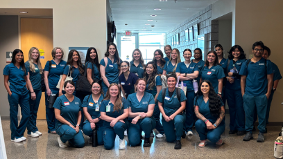CGCC Nursing Bootcamp attendees pose for a group photo wearing their scrubs