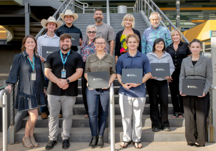CGCC Big Pitch winners pose with their awards outside Ironwood Hall at CGCC's Pecos campus
