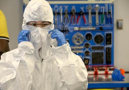 Semiconductor technicians wear "bunny suits" to minimize contaminants.