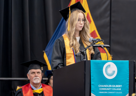 Kaitlin Greathouse at speaking at the 2025 CGCC Commencement ceremony