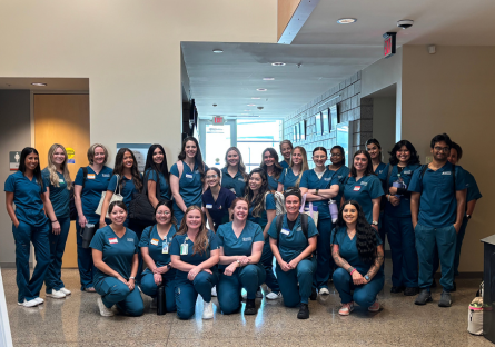CGCC Nursing Bootcamp attendees pose for a group photo wearing their scrubs