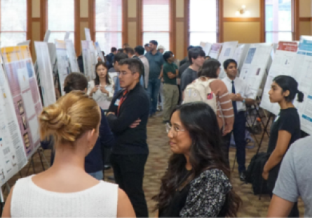Attendees look at posters at ASU’s School of Molecular Sciences’ Inaugural Spring Research Poster Symposium