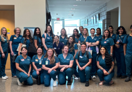 CGCC Nursing Bootcamp attendees pose for a group photo wearing their scrubs