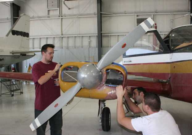 Student performing hands-on aircraft repair work during the Aviation Sheetmetal Bootcamp.